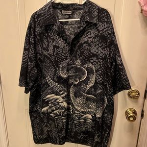 Very cool million Guy shirt with rattle snake design. Design Size 2XL.